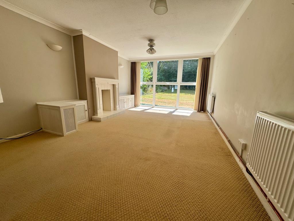 Lot: 113 - TWO-BEDROOM MAISONETTE FOR REDECORATION WITH GARAGE EN-BLOC - Living room alternative view